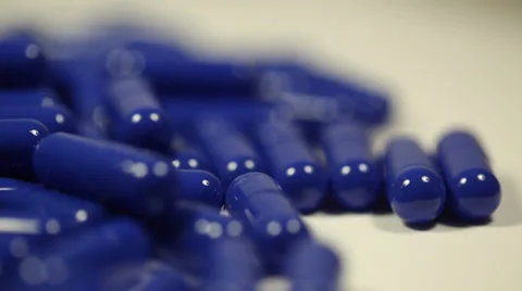 Rotating Blue Capsules Close Up 5 Video stock 34265948