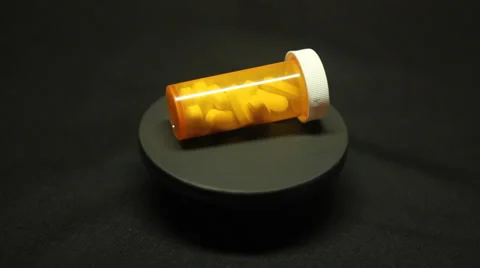 Rotating bottle of pills Video stock 32346687