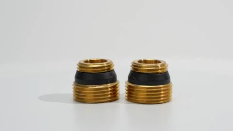 Rotating Brass Threaded Heating Adapters on White Stock Footage 337951749