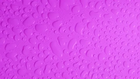 Rotating bright purple background with water drops top view . Stock Footage 207358371