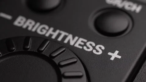 Rotating the Brightness Control Dial. Stock Footage 256237142