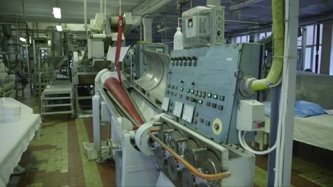 Rotating caramel forming line in a candy factory Video stock 242862791