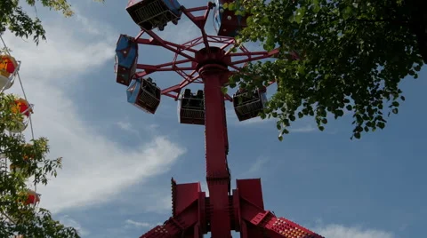 The rotating carousel in an amusement park Stock Footage 64815051