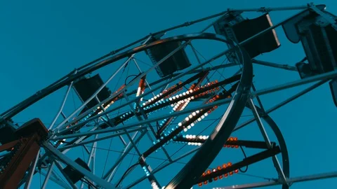 A rotating carousel at a small town carnival Stock Footage 90946687