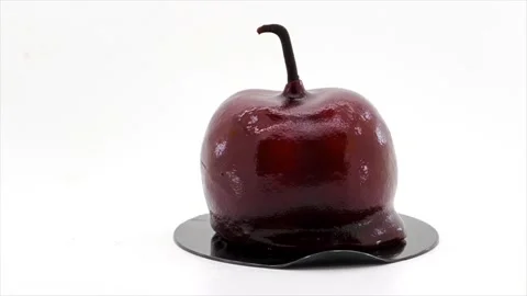 Rotating Cherry Shaped Gourmet Mousse Cake At Tea Time, UK 動画素材 158839668
