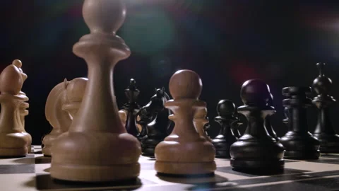 Rotating chessboard with combination of white and black wooden chess figures Stock Footage 166842917
