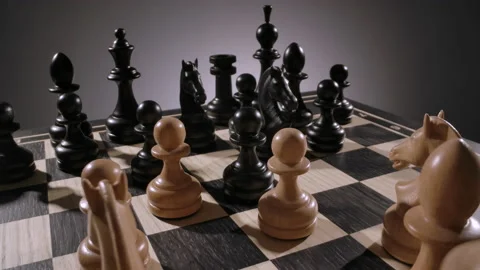 Rotating chessboard with combination of white and black wooden chess figures Stock Footage 166844569