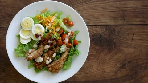 Rotating Chicken Cobb Salad with room for copy Stock Footage 140654577