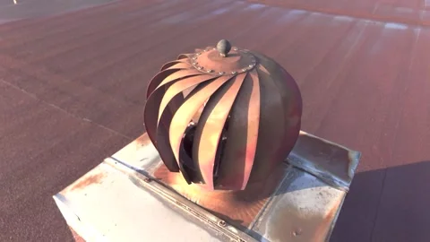 Rotating Chimney Ventilator on Rooftop with Urban Background. Spinning Turbine Stock Footage 304080359