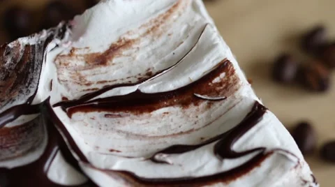 Rotating chocolate coffee cream cake macro Stock Footage 68488959