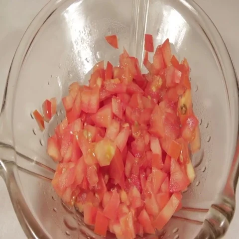 Rotating chopped tomatoes Stock Footage 69461142