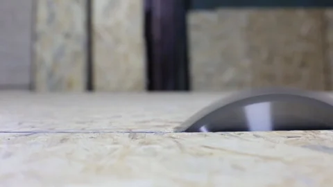 Rotating the circular saw on the table in the sawing shop Stock Footage 89569825