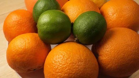 Rotating citrus fruits including oranges, limes and lemons Stock Footage 342437401