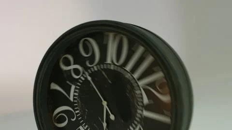 Rotating clock hits the floor. Stock Footage 59719135