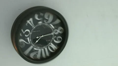 Rotating clock hits the floor.  Stock Footage 59719363