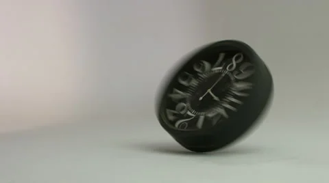 Rotating clock hits the floor.  Stock Footage 59719438