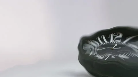 Rotating clock hits the floor.  Video stock 59737277