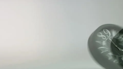 Rotating clock hits the floor.  Stock Footage 59737576