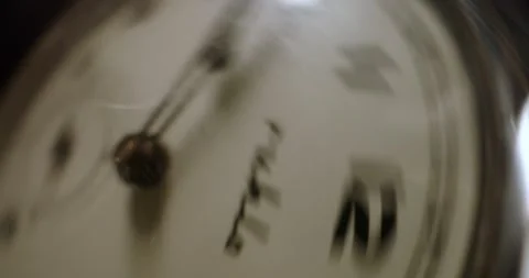 A rotating clock shot through a periprobe lens Stock Footage 323724244