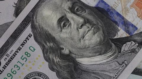 Rotating close up of hundred dollar bills background Stock Footage 333185718