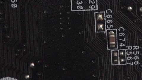 Rotating close up macro footage of printed circuit board PCB in 4K Vídeo Stock 123021456