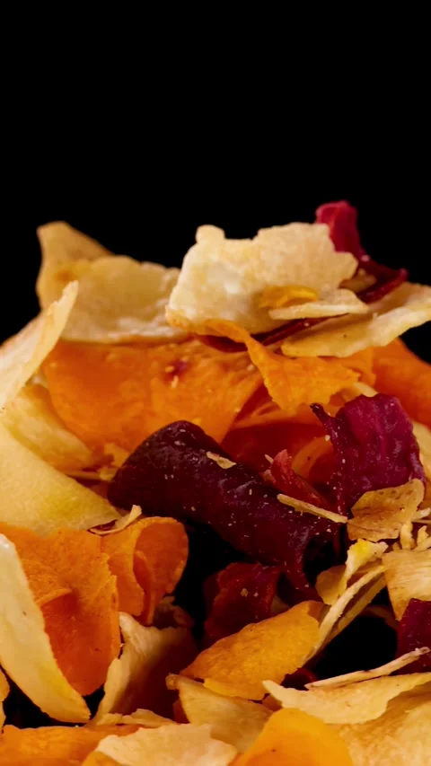 Rotating Close-Up of Mixed Root Vegetable Chips Snack Stock Footage 321443710