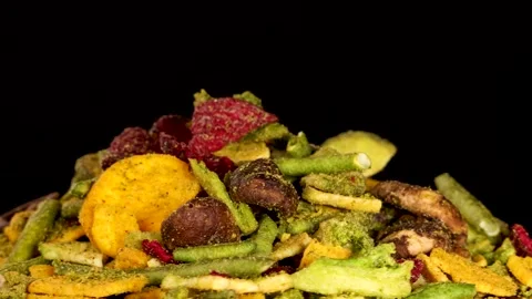 Rotating Close-Up of Mixed Vegetable Chips Snack Pile Stock Footage 319462582