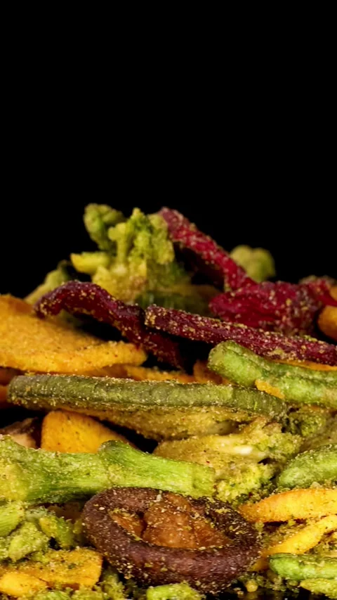 Rotating Close-Up of Mixed Vegetable Chips Snack Assortment Stock Footage 321451014