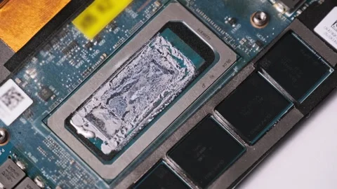 Rotating Close-Up of an Old CPU with Dried Thermal Compound Stock Footage 314012958