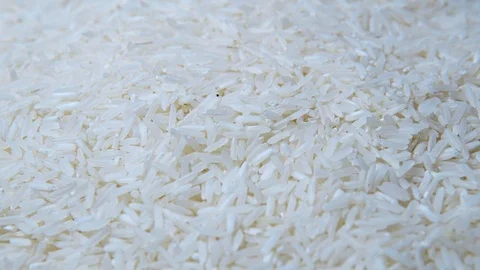 Rotating close-up pile of raw rice Stock Footage 101121478