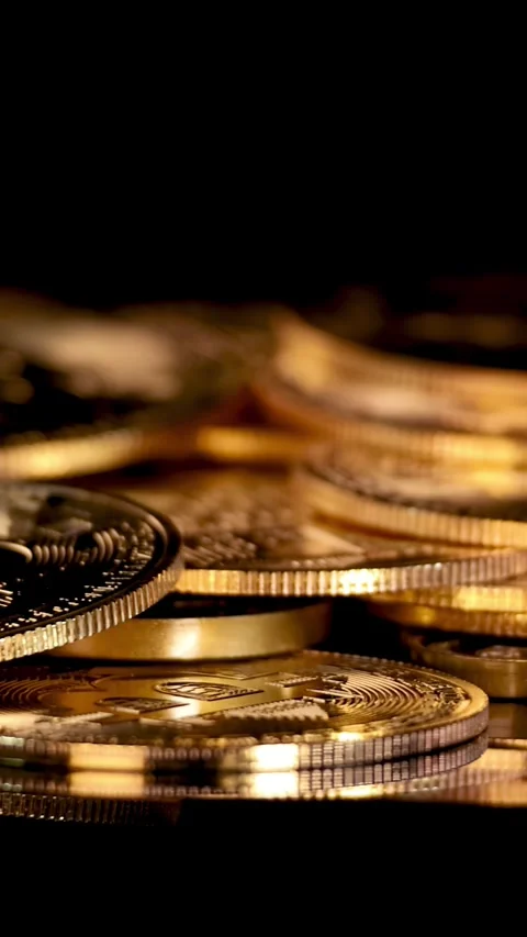 Rotating Close-Up of Stacked Golden Cryptocurrency Coins Stock Footage 316801501