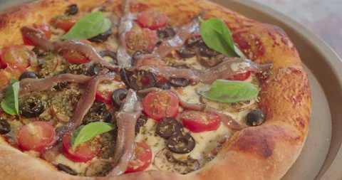 Rotating close view of home made vegetarian pizza Stock Footage 194503322