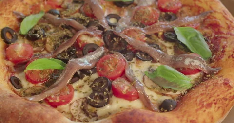 Rotating close view of home made vegetarian pizza Stock Footage 194503363