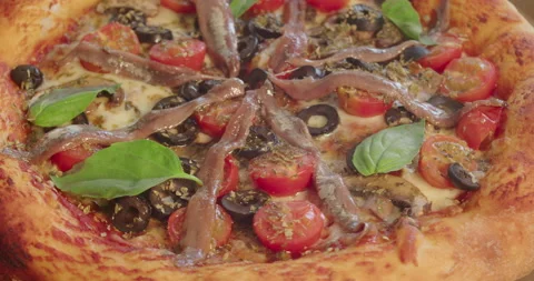 Rotating close view of home made vegetarian pizza. Stock Footage 194504385