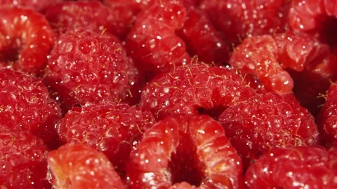Rotating closeup view of raspberries Stock Footage 80132141