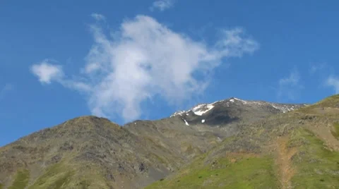Rotating Cloud Forming over Mountain Stock Footage 8520060
