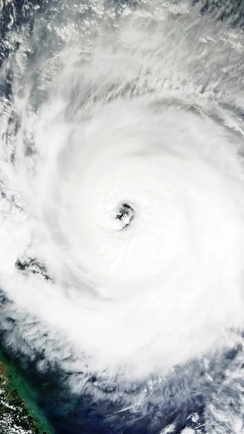 Rotating clouds hurricane eye, view from satellite, vertical video Stock Footage 253657576