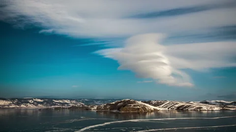 Rotating clouds over lake Baikal Stock Footage 68933127