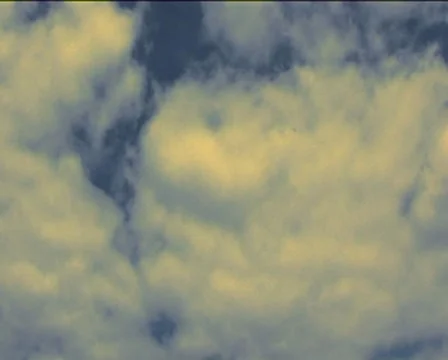 Rotating clouds (white/yellow) Stock Footage 8343850