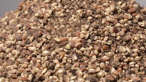 Rotating Coarse Ground Black Pepper Macro Texture Background Stock-Footage 331115376