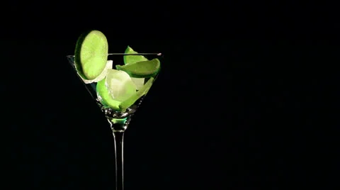 Rotating cocktail with  lime and ice Stock Footage 23977848