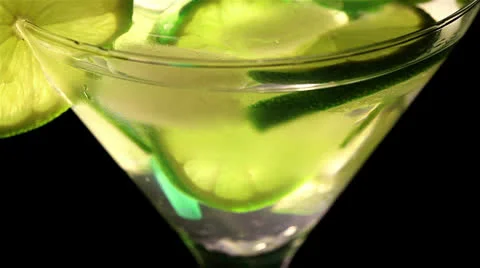 Rotating cocktail with  lime and ice. Top  view Stock Footage 23978261
