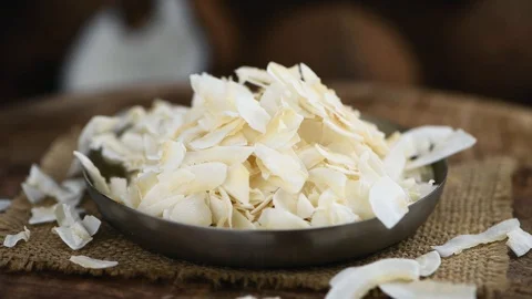 Rotating Coconut Chips (seamless loopable) Stock Footage 121521151