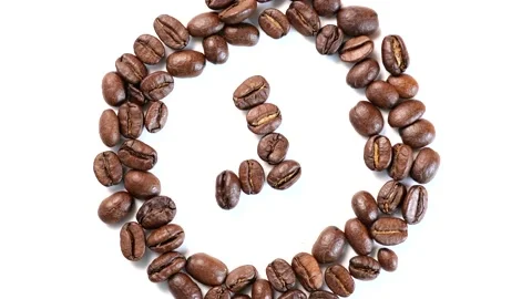 Rotating coffee beans in clock shape Video stock 162898874