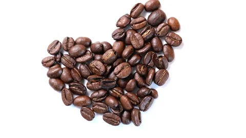 Rotating coffee beans in heart shape Stock Footage 147020727