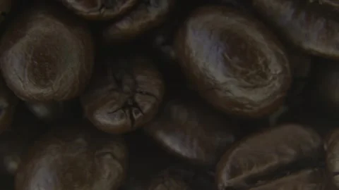 Rotating Coffee Beans Macro Texture Background. 스톡 동영상 334575706