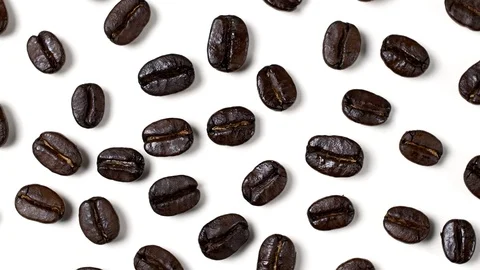 Rotating of coffee beans on white background Stock Footage 97377839