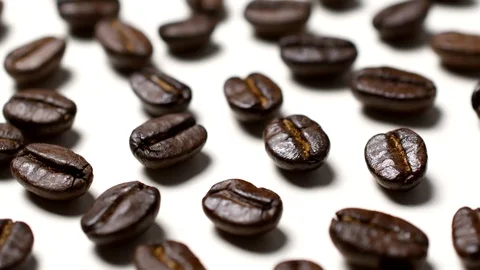 Rotating of coffee beans on white background Stock Footage 97378277