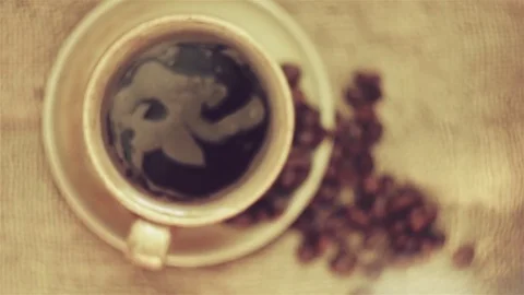 Rotating the coffee in the cup Video stock 80032265