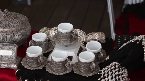 Rotating Coffee Cups on the Stand Made of Jewelry Silver Filigree Stock-Footage 83521354